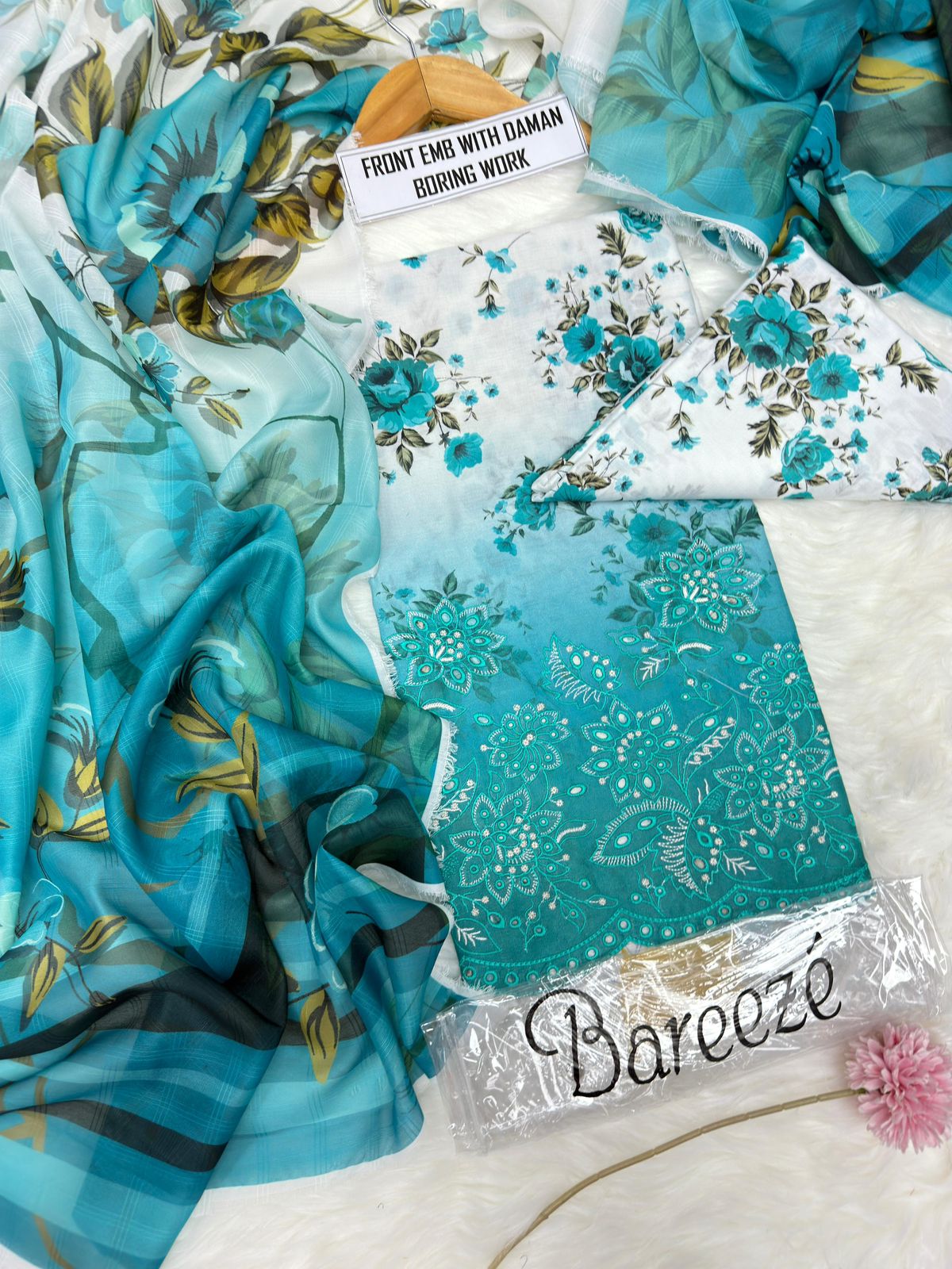 3-piece unstitched lawn suit by Bareeze featuring front embroidery with daman boring work.