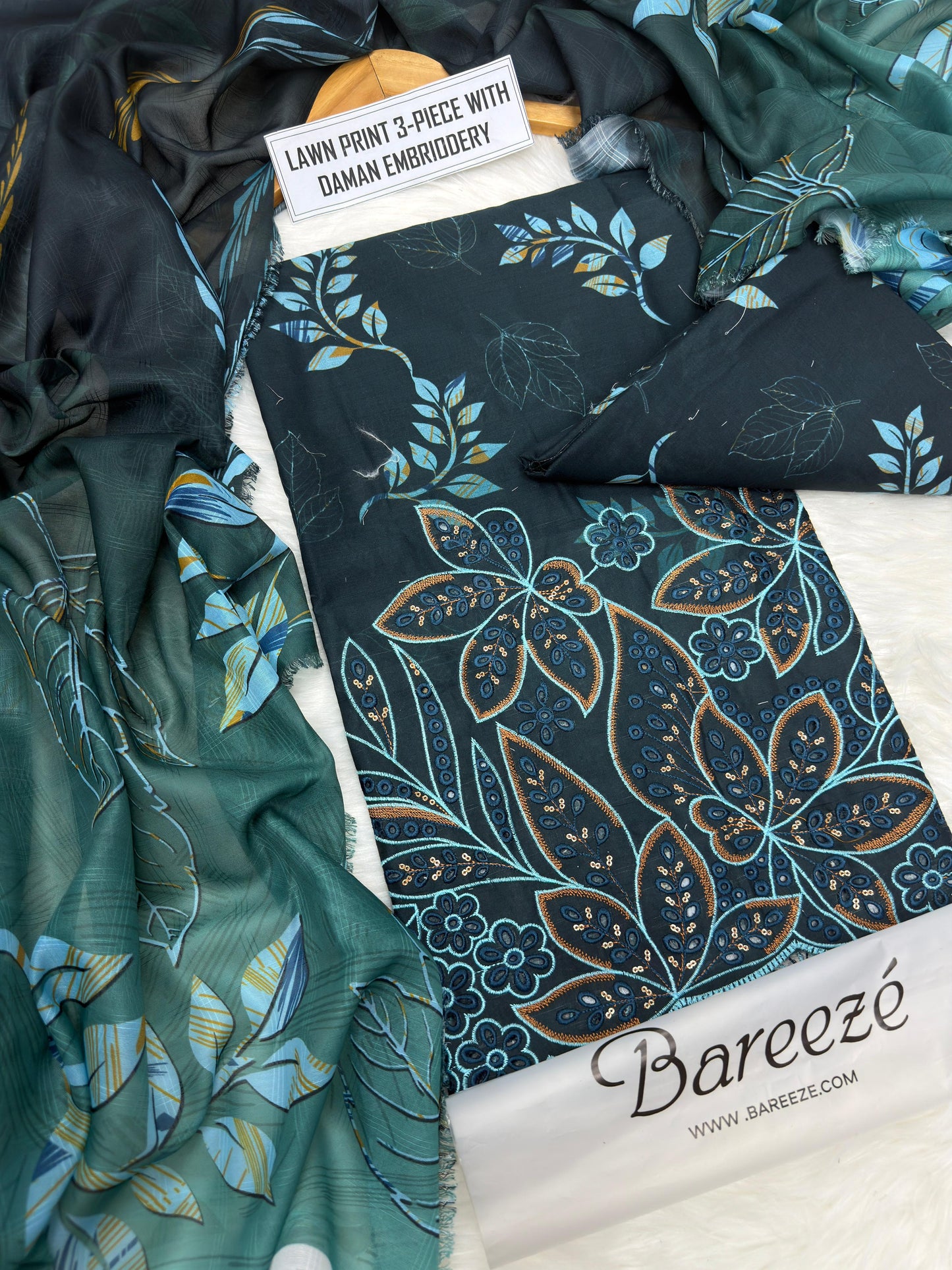 3-piece unstitched lawn suit by Bareeze featuring lawn print with daman embroidery.