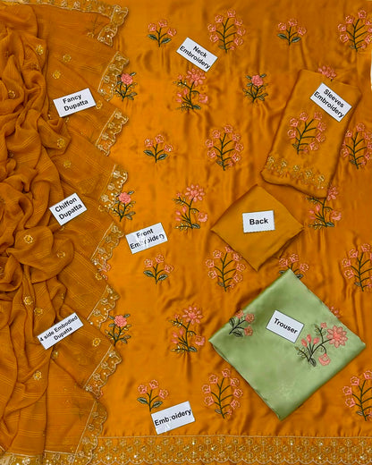 3-piece embroidered suit in mustard yellow. With beautiful floral embroidery on shirt and trouser paired with a fancy 4-side embroidered chiffon dupatta
