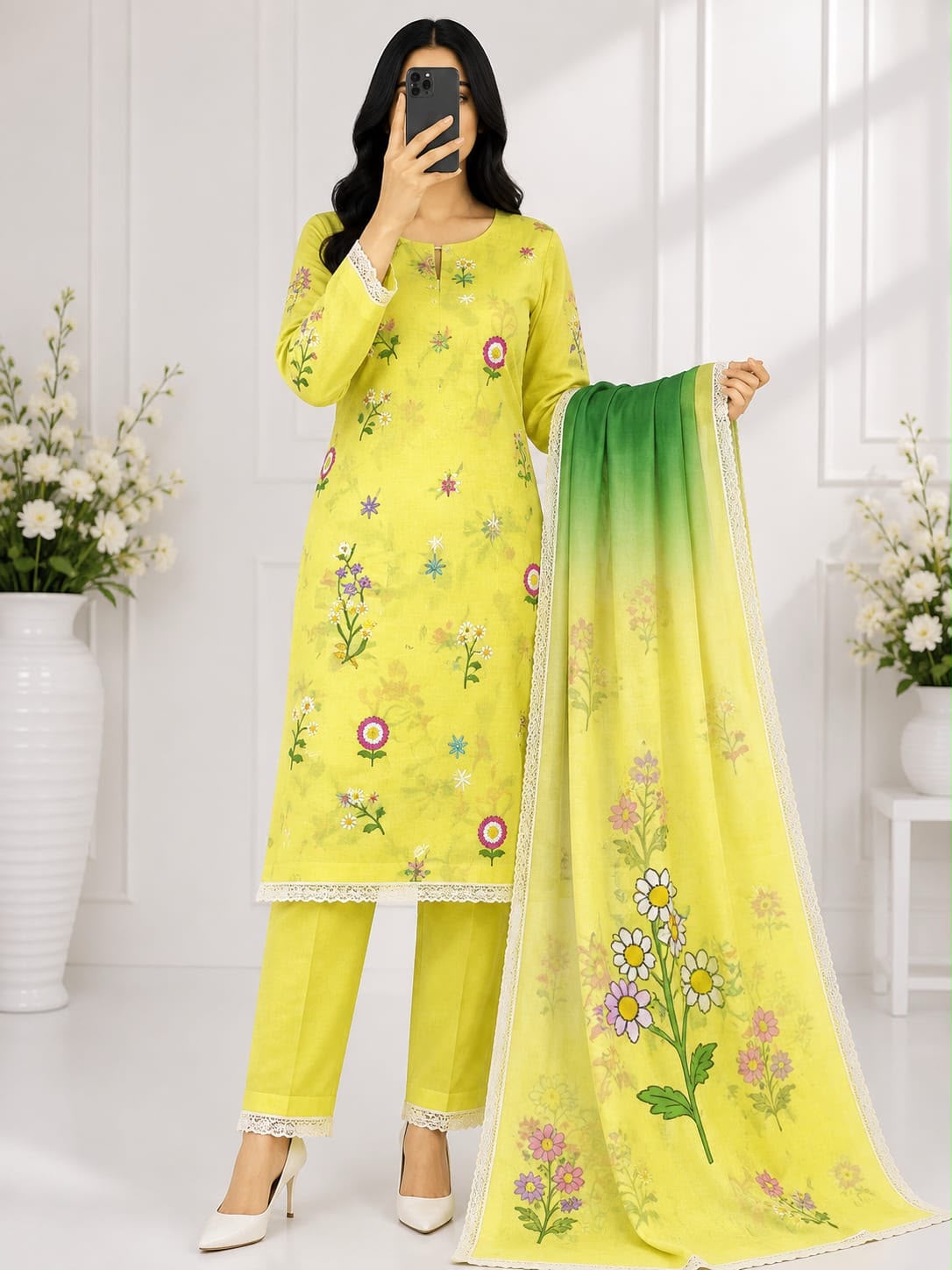 3-piece embroidered lawn suit in lemon yellow. With multi-color floral embroidery and  dupatta,