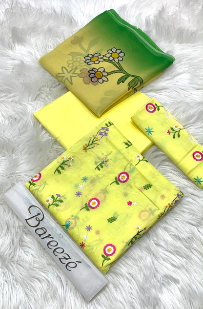 3-piece embroidered lawn suit in lemon yellow. With multi-color floral embroidery and  dupatta,