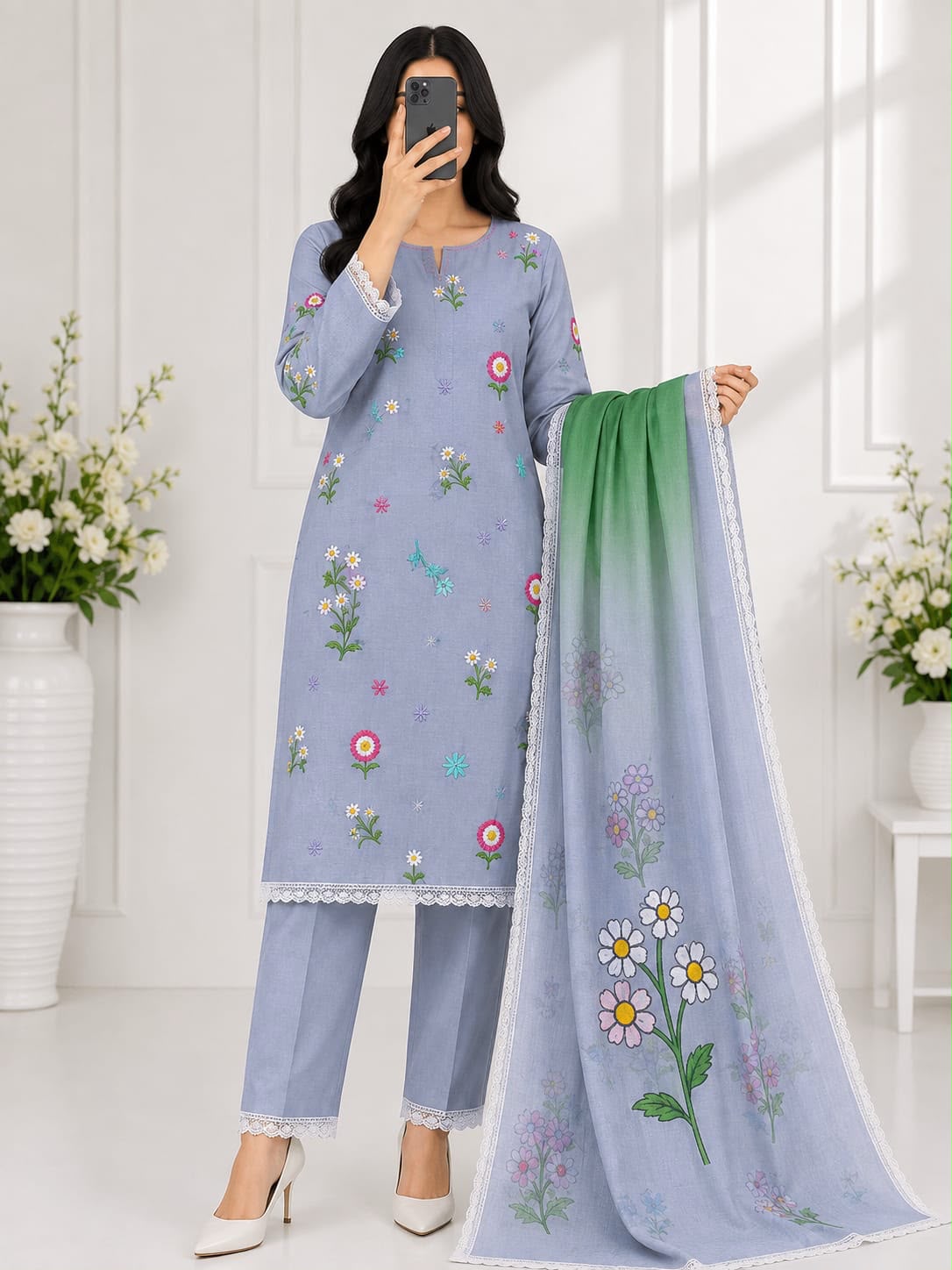 3-piece embroidered lawn suit in powder blue. With cute floral embroidery,