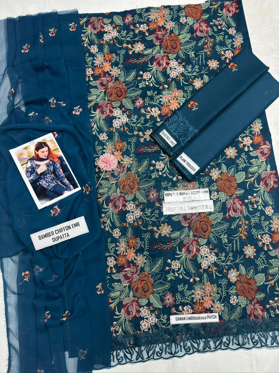 3-piece heavy embroidered lawn suit by Bareeze.