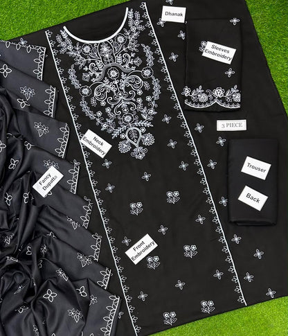 Bareeze Winter – Black Dhanak 3-piece flat lay showing front embroidery, sleeves, trouser and fancy dupatta